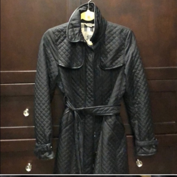 Quilted Burberry trench coat with London checkered pattern inside and belt.